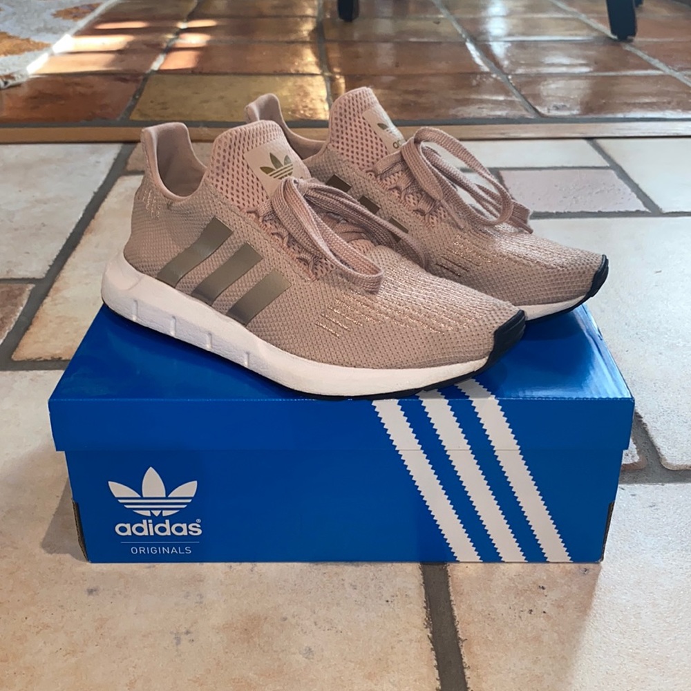 Women’s Adidas “Swift Run” shoes